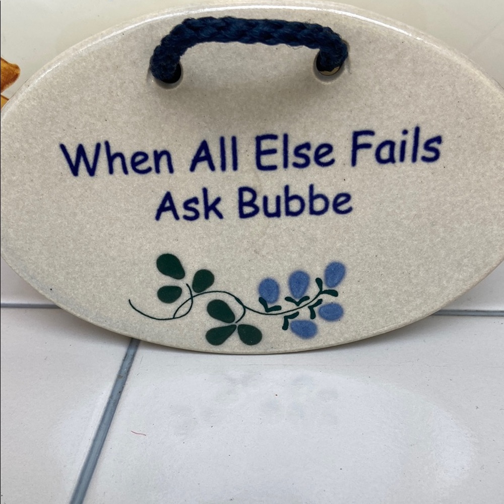 Ceramic Plaque with Blue Text and Floral Design